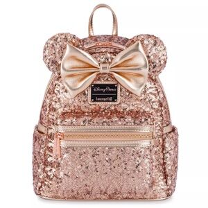 NWOT Disney Loungefly rose gold sequin backpack. Never used and beautiful!